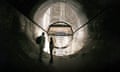 Visitors in an air supply tunnel in Sonnenberg bunker, Lucerne, Switzerland.